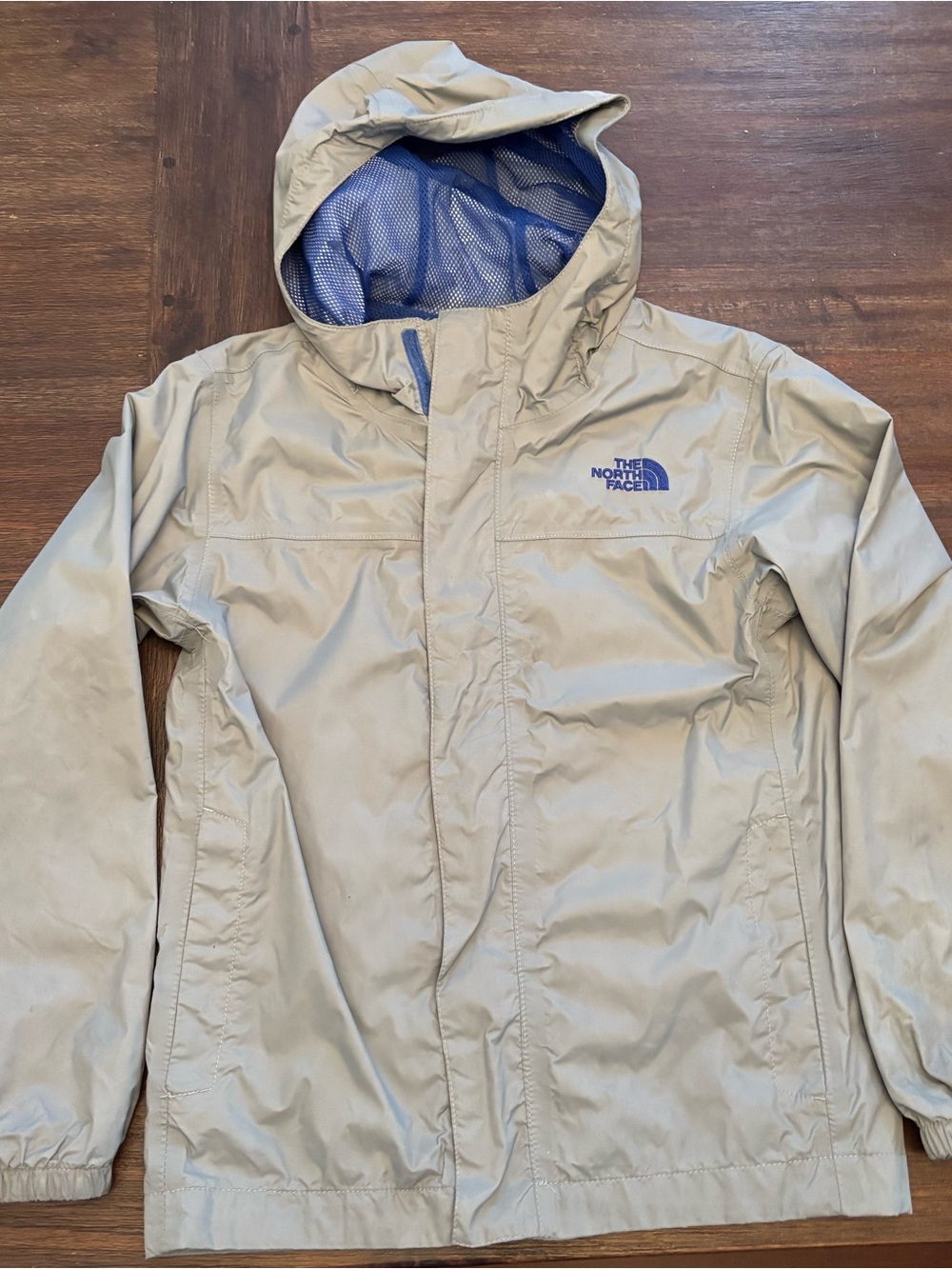 The North Face Light Khaki Rain Jacket with Blue Logo